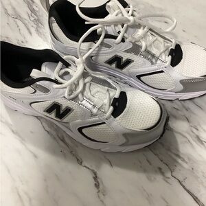 New Balance Black and White Athletic Shoes